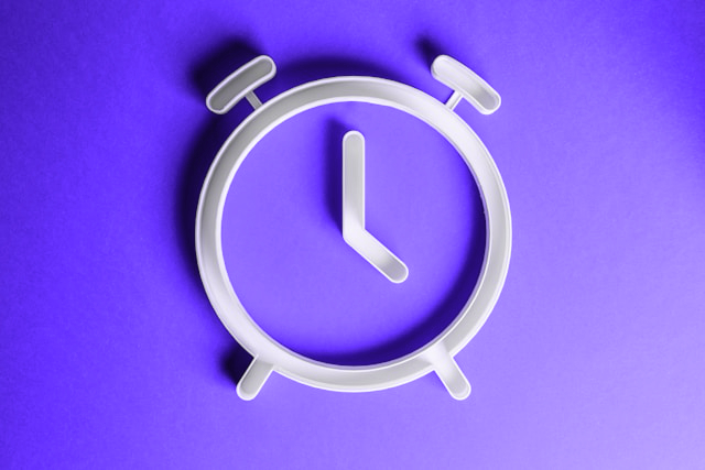 Clock on a vivid orange background